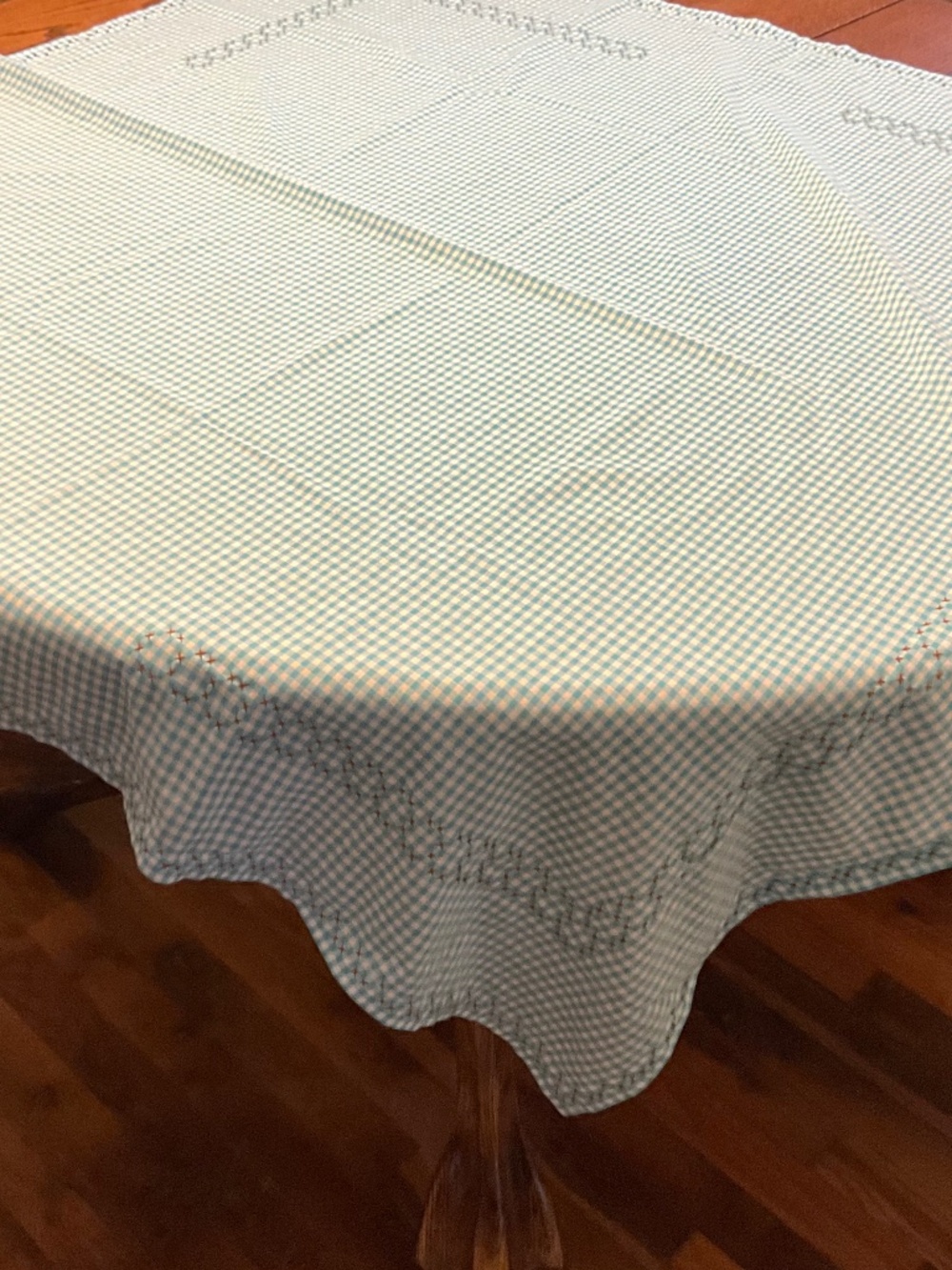 Gingham Tablecloth  Handcrafted cross stitch trim.  43”X43"